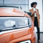 african american woman with new car in mesa arizona
